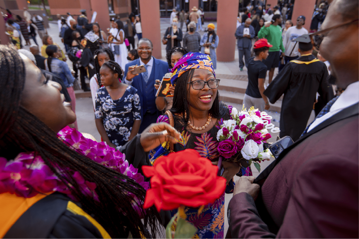 2022 black graduation celebration smiling face with flowers